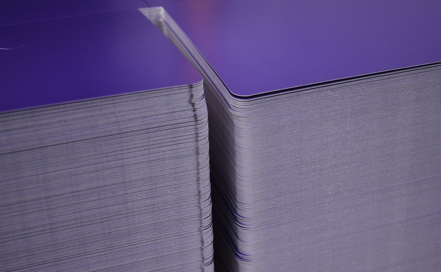 Close-up detail of stacked plastic cutouts