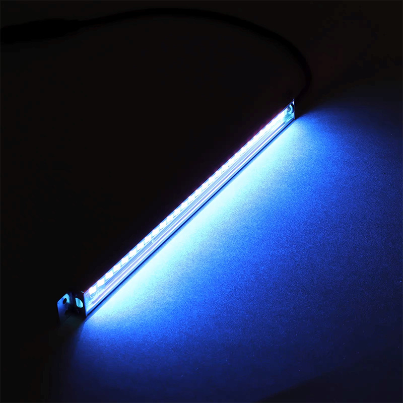 LED glow bar shining on a surface in the darkness