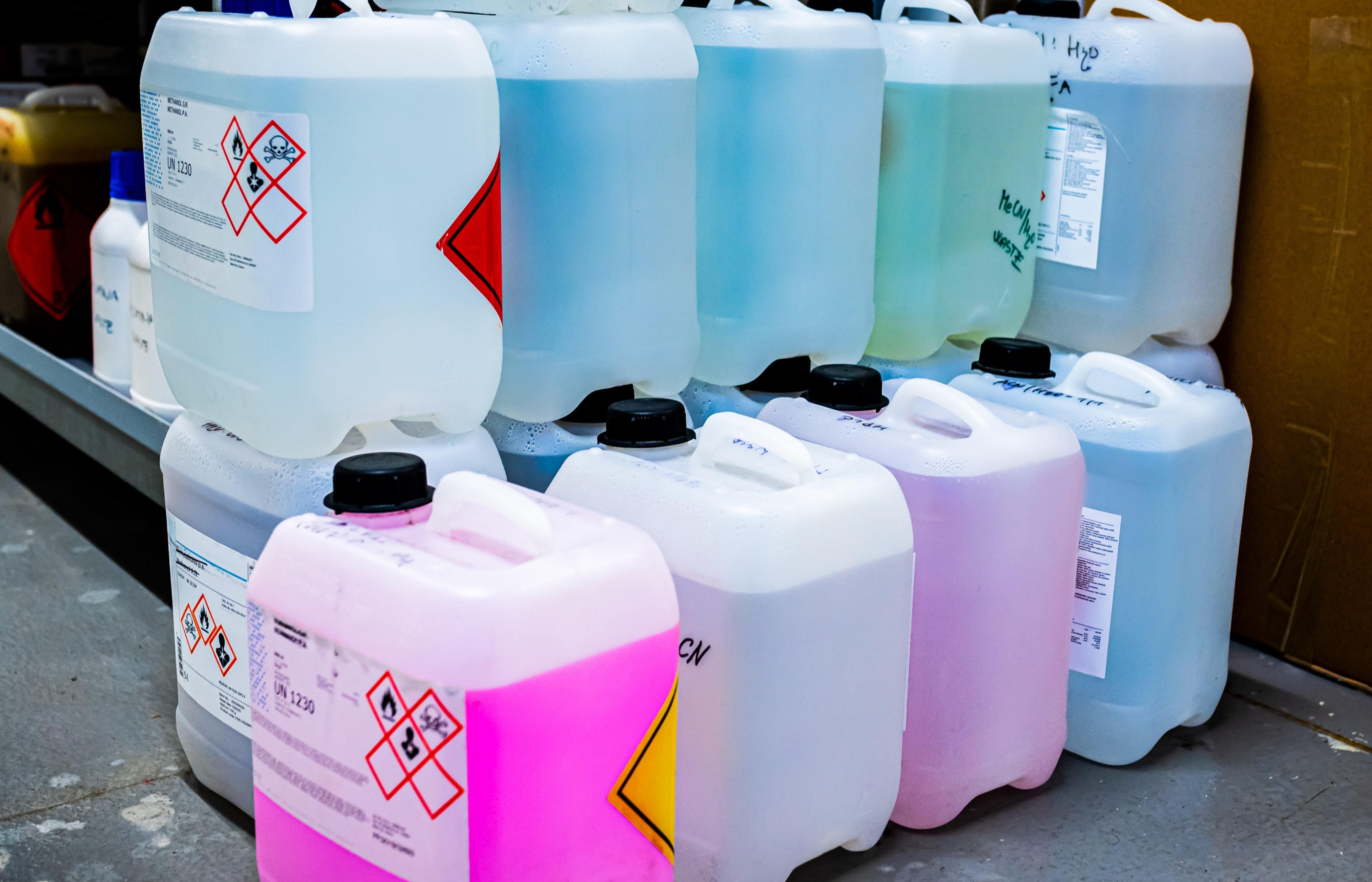 Organized assortment of chemical-filled jugs